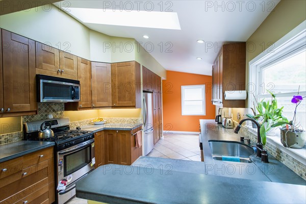 Counters and cabinets in domestic kitchen