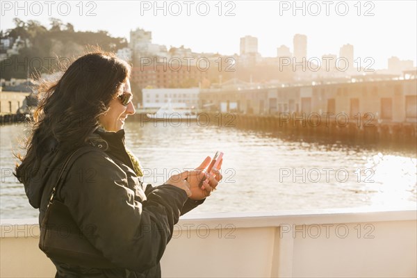 Hispanic woman on boardwalk