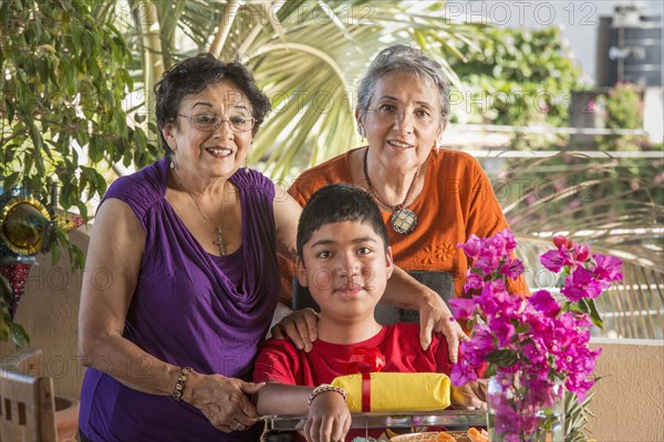 Hispanic family smiling together