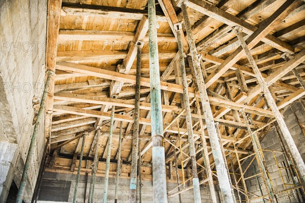 Low angle view of wooden house frame