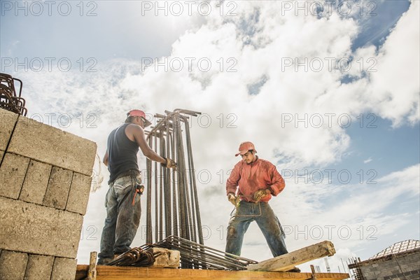Hispanic construction workers at construction site