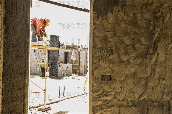 Hispanic construction workers at construction site