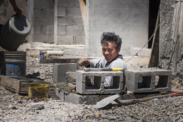 Hispanic construction worker at construction site