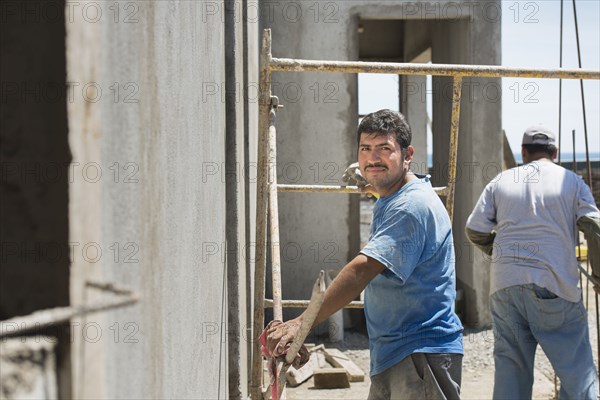 Hispanic construction worker at construction site