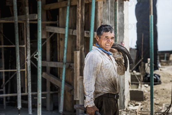 Hispanic construction worker at construction site