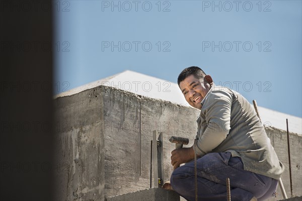 Hispanic construction worker at construction site