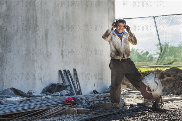 Hispanic construction worker at construction site