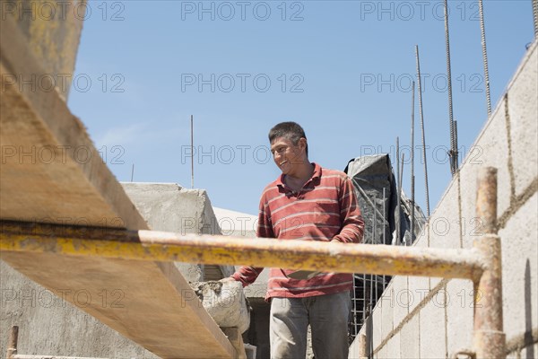 Hispanic construction worker at construction site