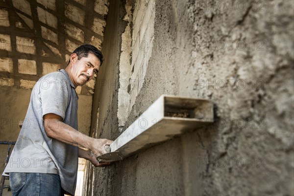 Hispanic construction worker at construction site