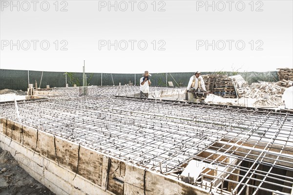 Hispanic construction workers at construction site