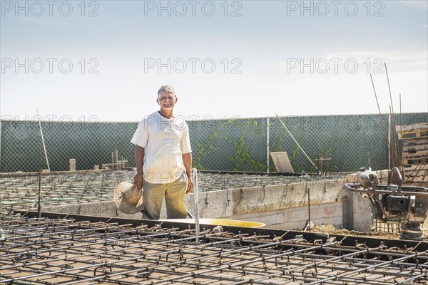 Hispanic construction worker at construction site