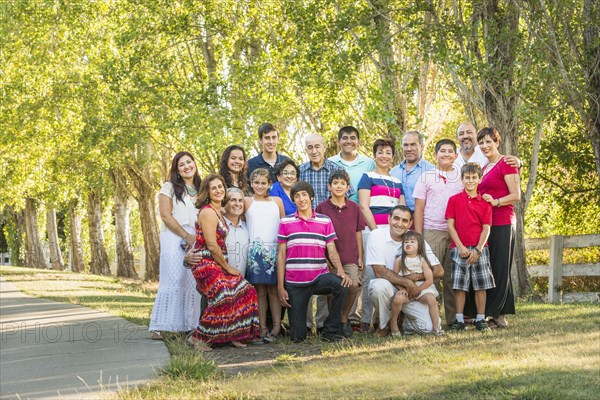 Extended family posing together outdoors