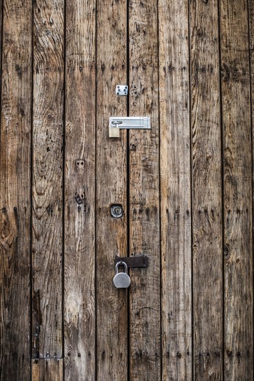 Close up of padlocks on secure door