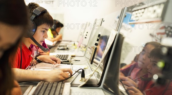 Students using computers at desk