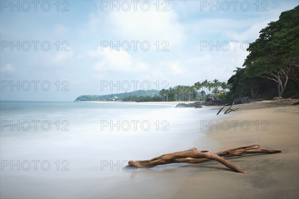 Ocean waves on sandy beach