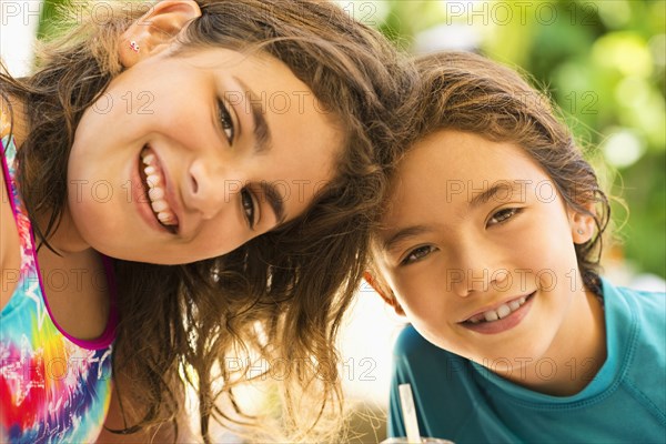 Close up of sisters smiling