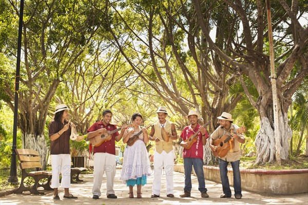 Musicians performing in park