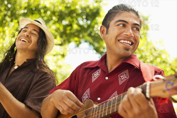 Musicians performing in park