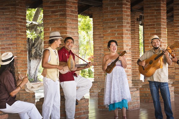 Musicians performing in courtyard