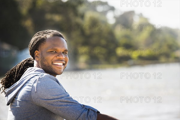 African American man smiling outdoors