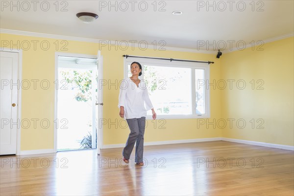 Woman admiring new home