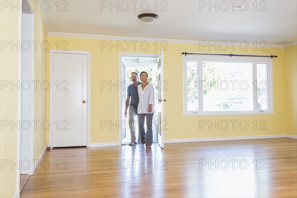 Couple admiring new home