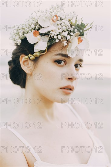 Caucasian bride at beach