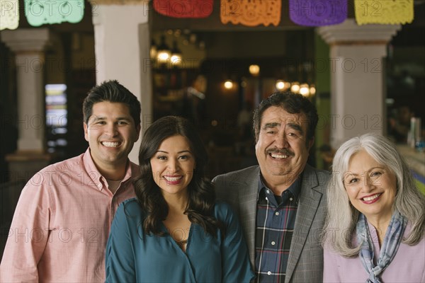 Portrait of smiling couples in restaurant