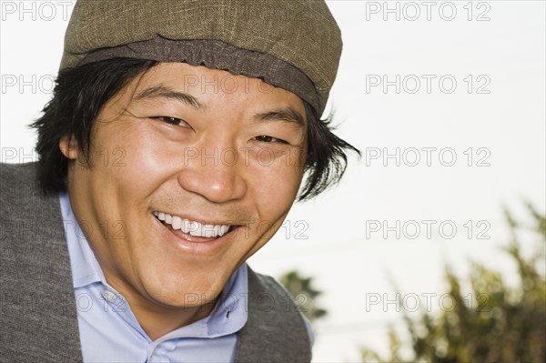 Asian man smiling