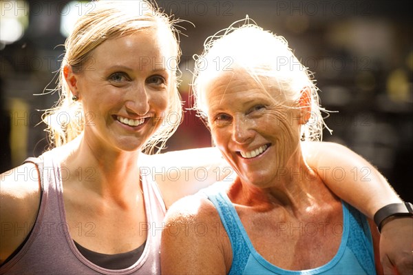 Portrait of smiling women hugging