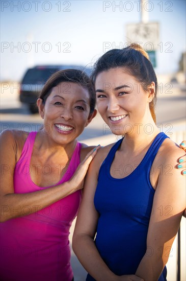 Portrait of smiling mother and daughter