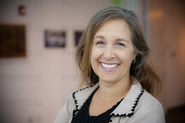 Portrait of smiling Caucasian businesswoman