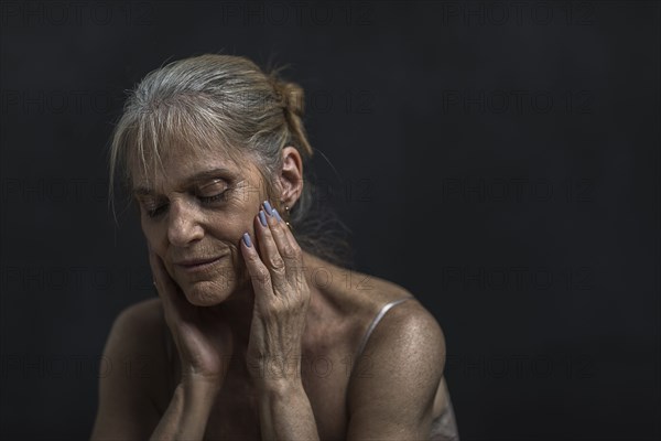 Portrait of pensive older Caucasian woman