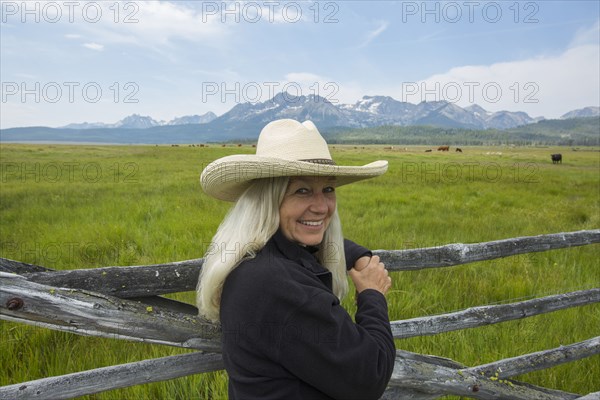 Caucasian woman standing in rural field