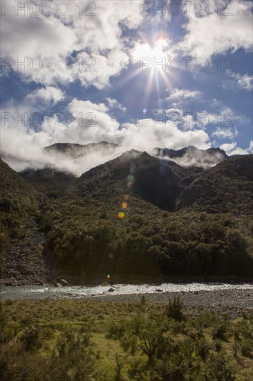 Mountains and river in remote landscape