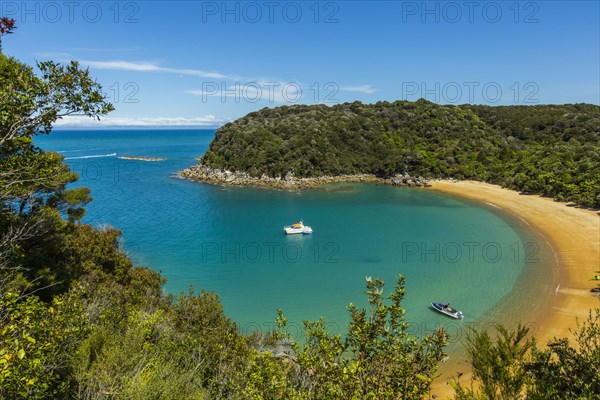 High angle view of boats in remote beach cove