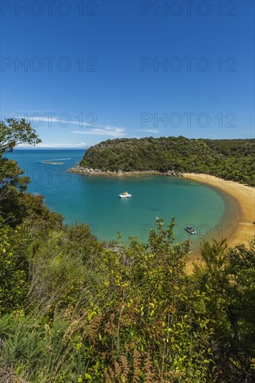 High angle view of boats in remote beach cove