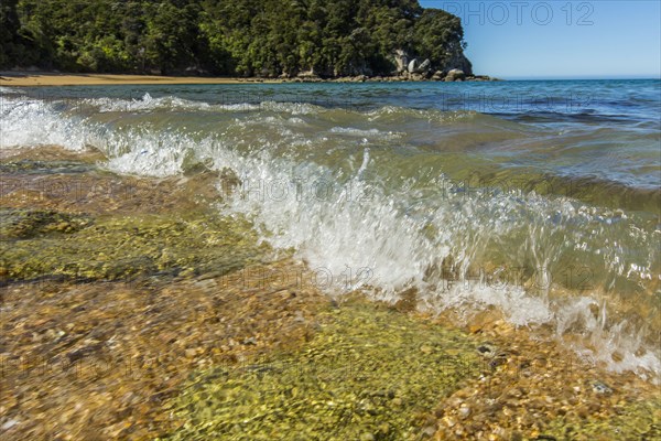 Ocean waves crashing on remote beach