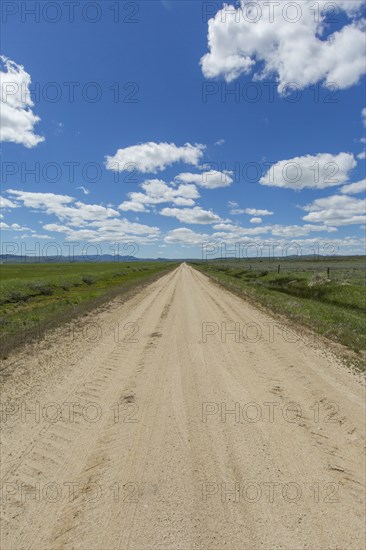 Dirt road toward mountains