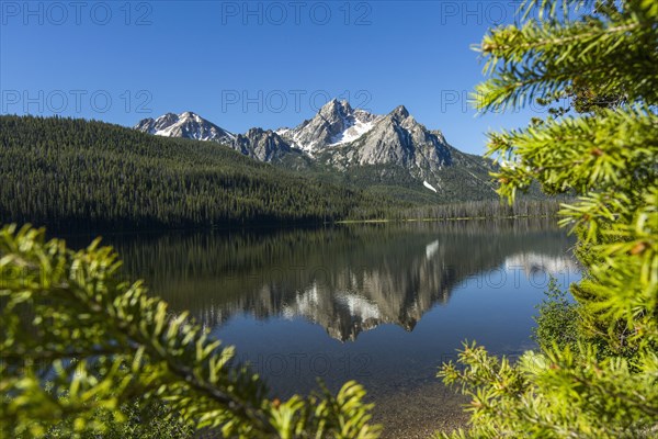 Reflection of mountain in still lake