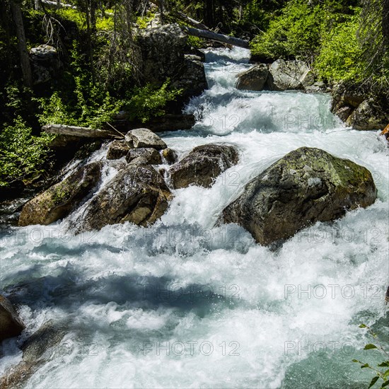 River rapids flowing at rocks