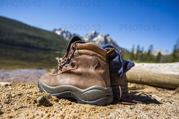 Boots and socks near river