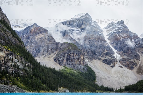 Lake at foggy mountain