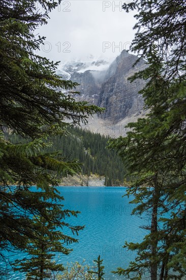 Lake at foggy mountain