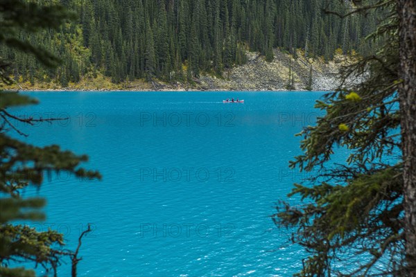 People in canoe on lake