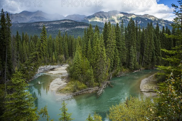 Bending river near mountain range