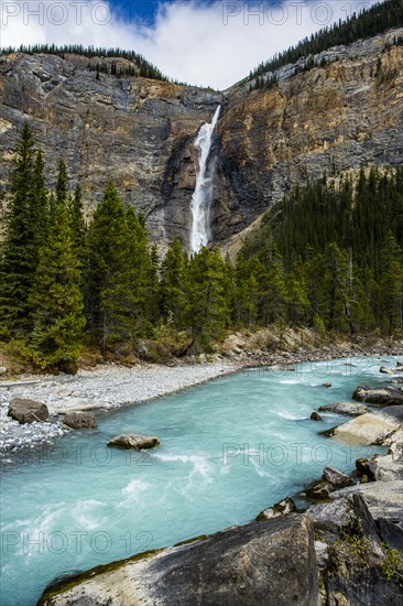 Waterfall flowing over cliff