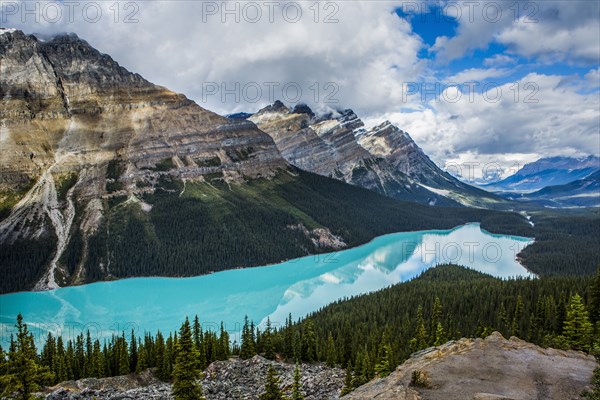 Reflection of clouds in still mountain lake