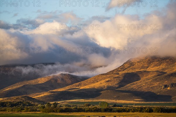 Clouds over mountain range