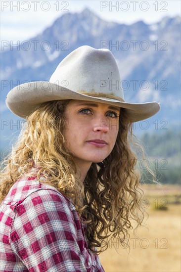 Portrait of Caucasian woman near mountain